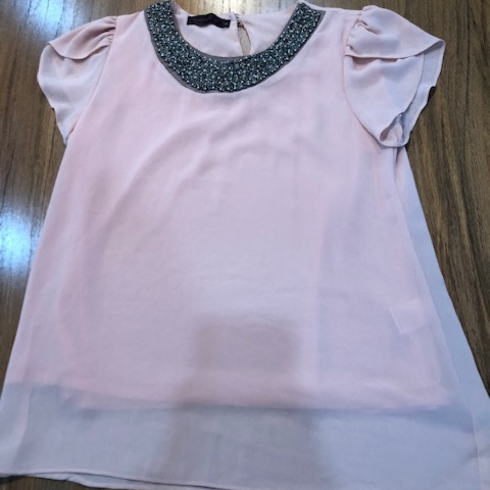 salmon colored top